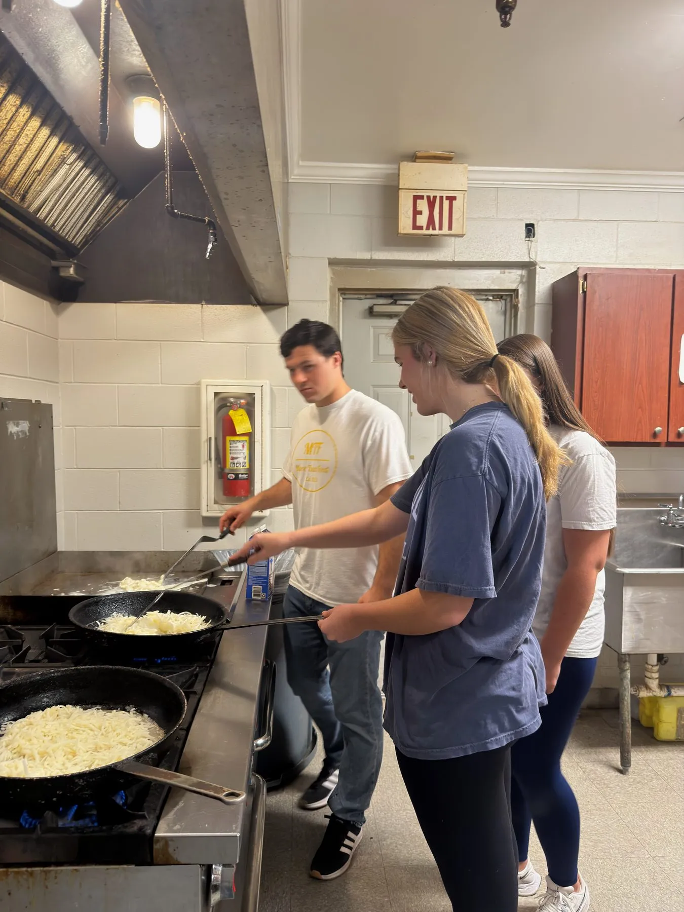 More Than Food volunteers and community members at a service event