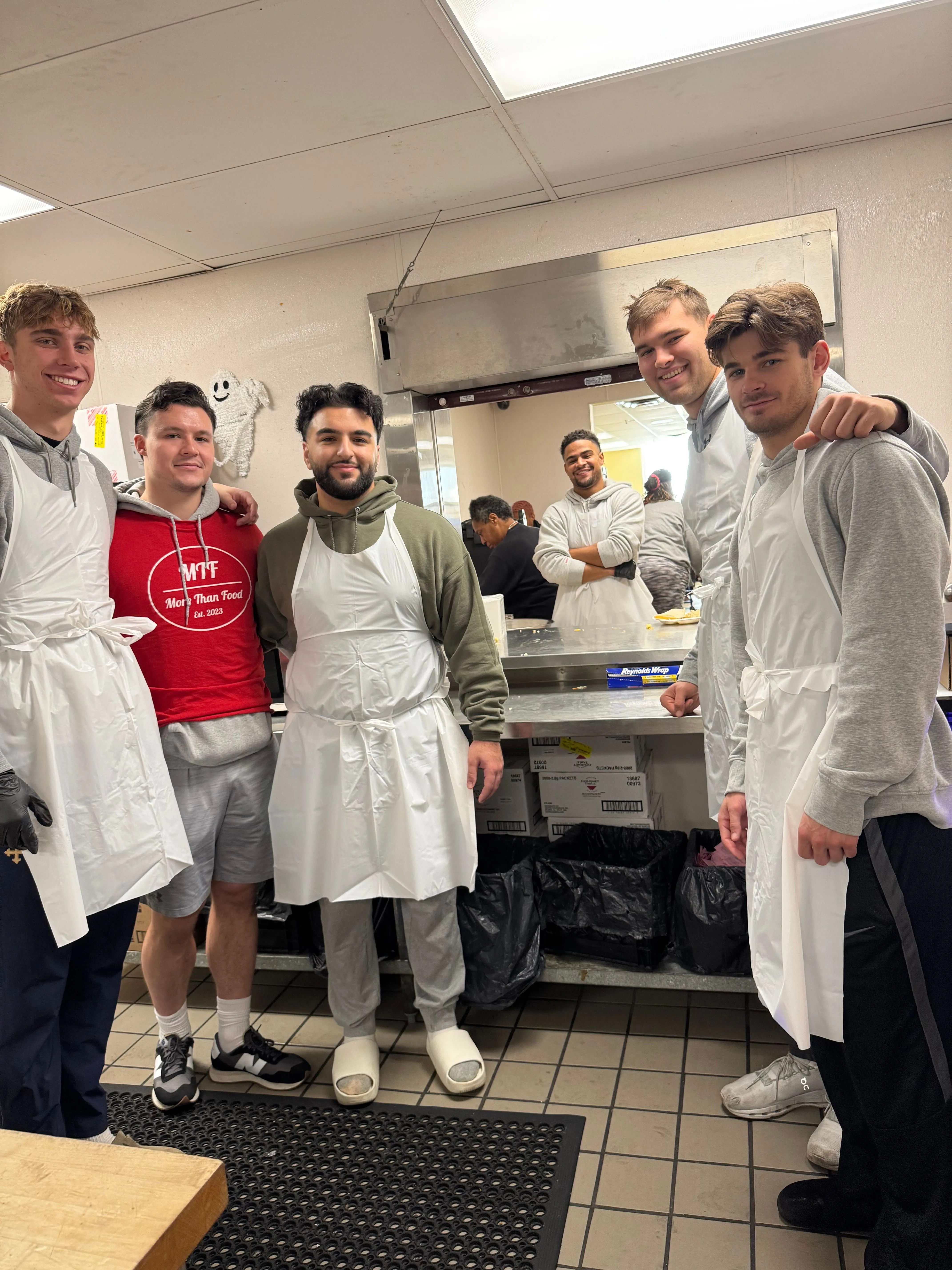 More Than Food volunteers gathered together at a community service event